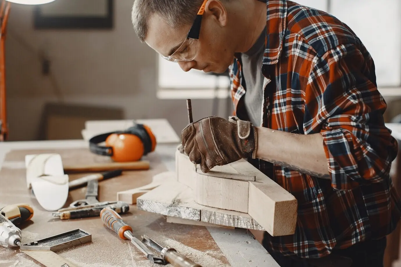 Craftsman making a wood piece