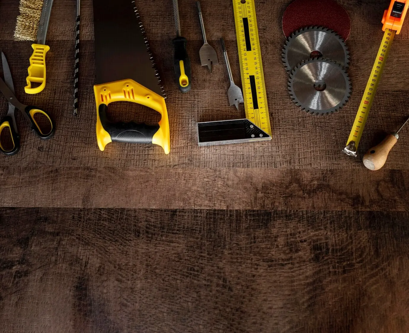Overhead view of wood tools on a desk